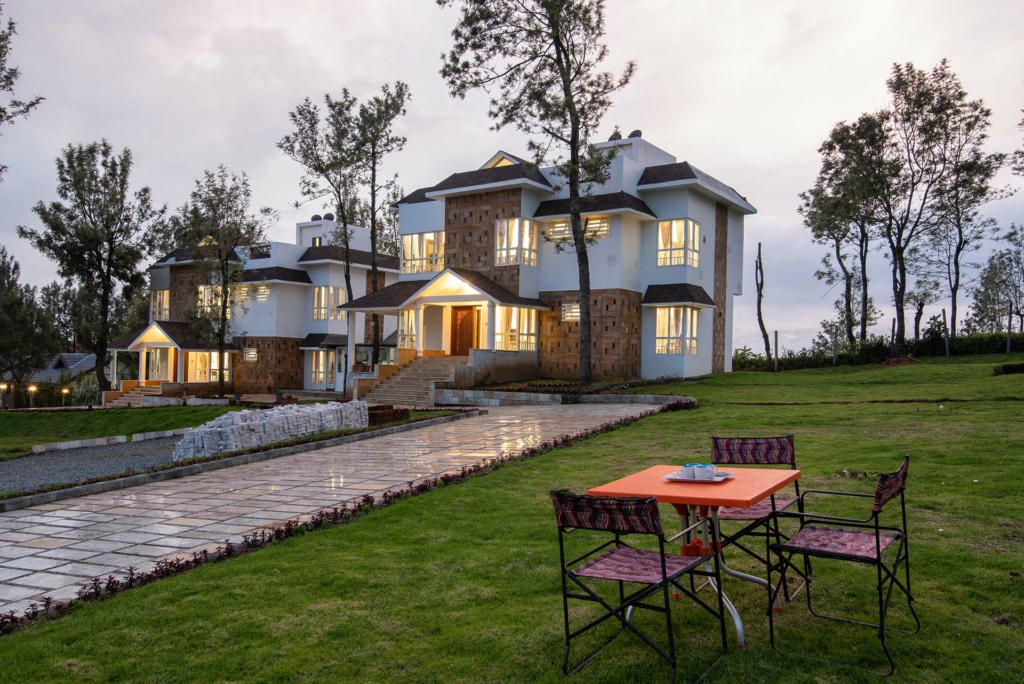 Mountain-facing, modern decor at Villa Sullivan in Ooty