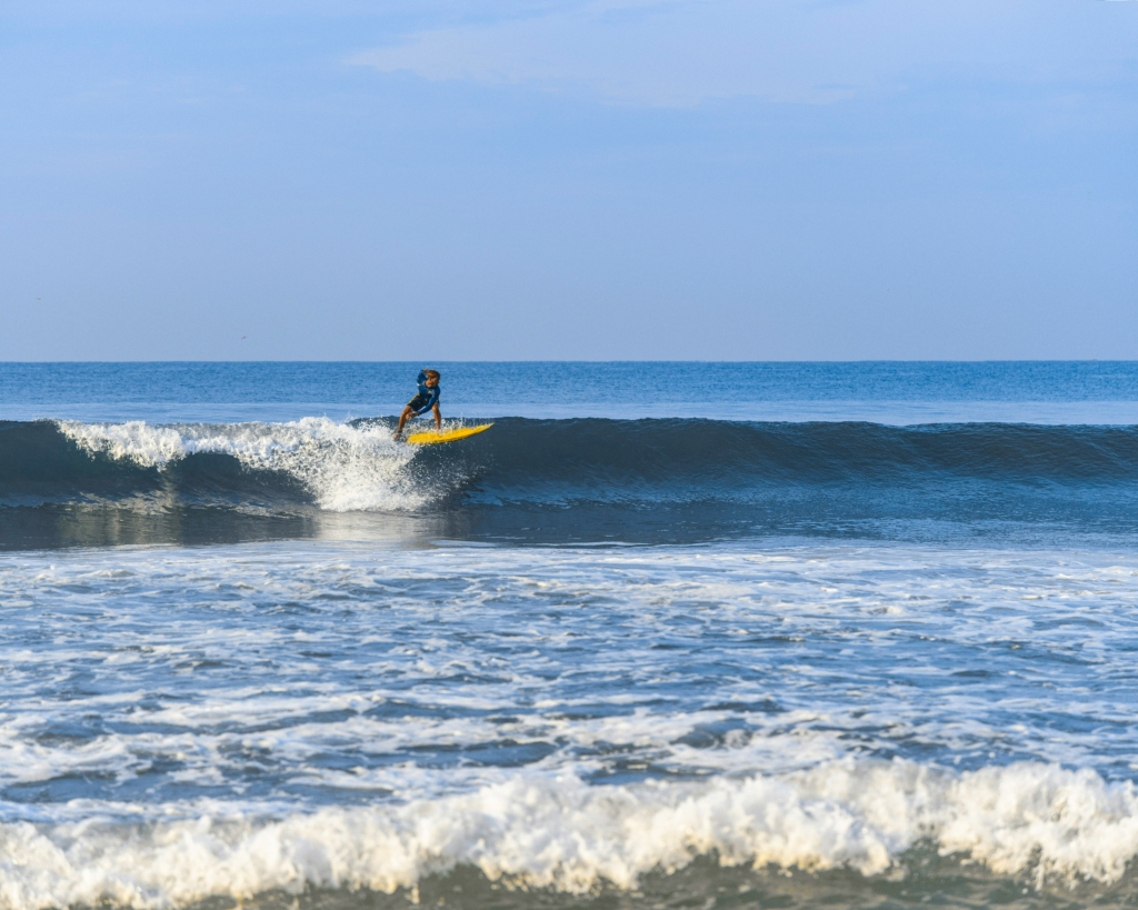 surfing at varkala beach in kerala as one day trip places