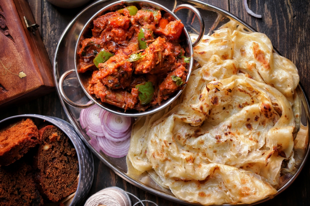 Kerala Protha with curry
PC: Saveurs Secretes - https://www.pexels.com/photo/close-up-of-food-10810650/