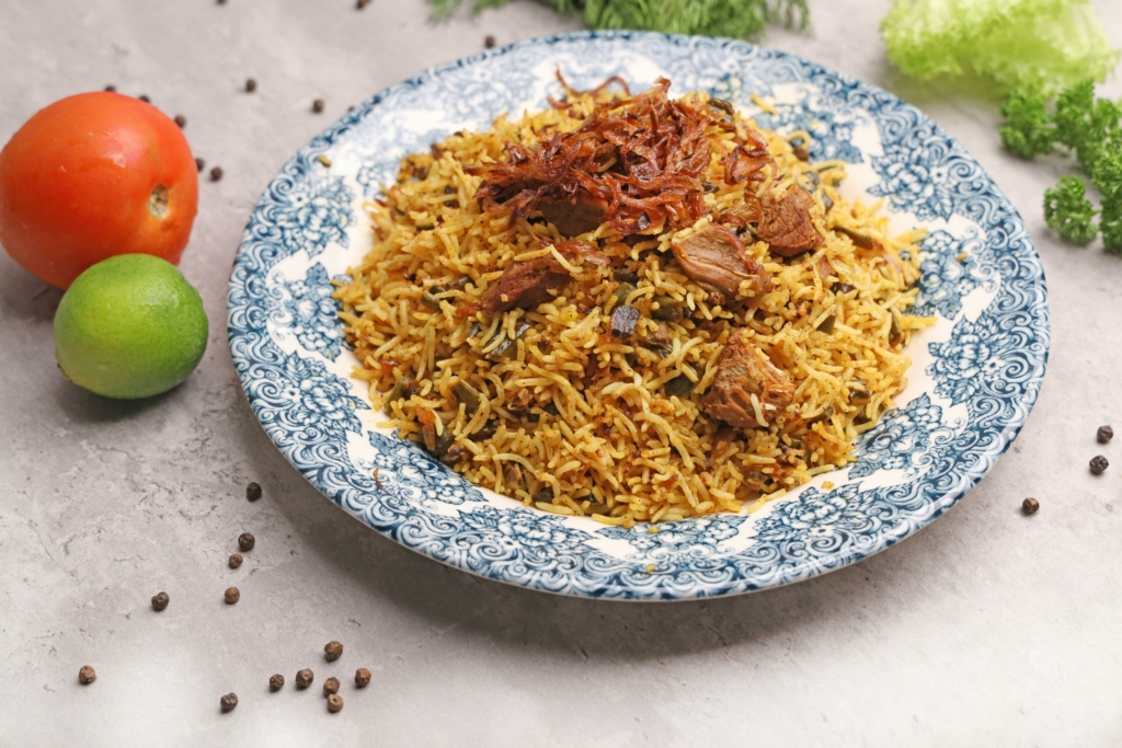 Malabar Biryani
PC: Shameel mukkath - https://www.pexels.com/photo/rice-biryani-dish-on-blue-plate-14731729/