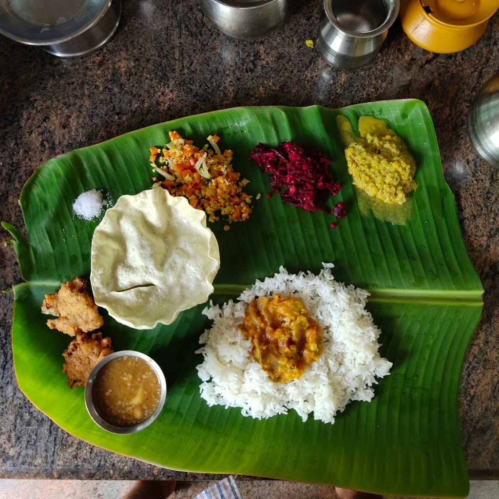 Tamil Cuisine in Pondicherry
PC: Saktheeswaran Govindarajan - https://unsplash.com/photos/white-rice-on-green-plate-yCIcDyKm440