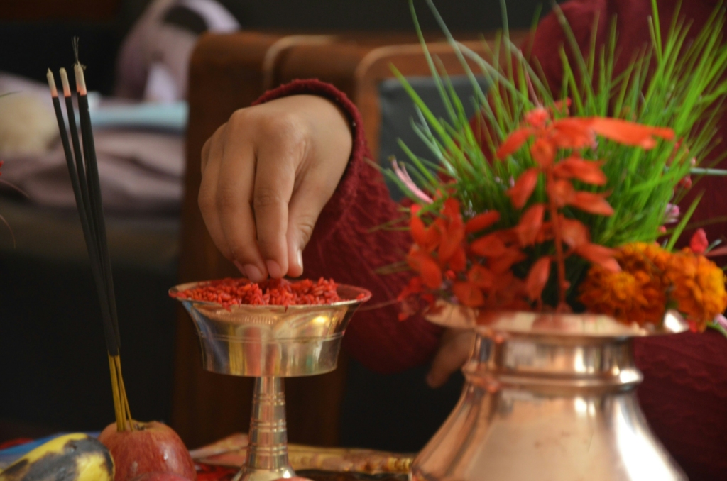 Customised Decor and Vibe for Bhai Dooj
PC: Sujan Shahi - https://unsplash.com/photos/a-person-putting-red-food-in-a-bowl-dW-5JcE8csg