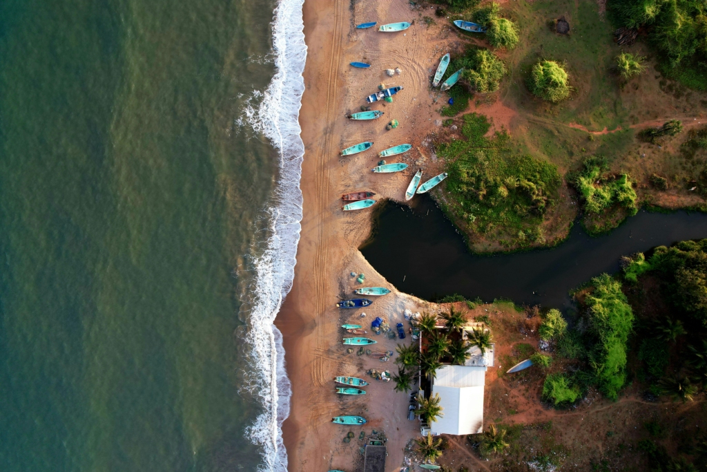 Beach in Pondicherry
PC: Zoshua Colah - https://unsplash.com/photos/an-aerial-view-of-a-beach-with-a-lot-of-boats-EObBwi2D5Qc