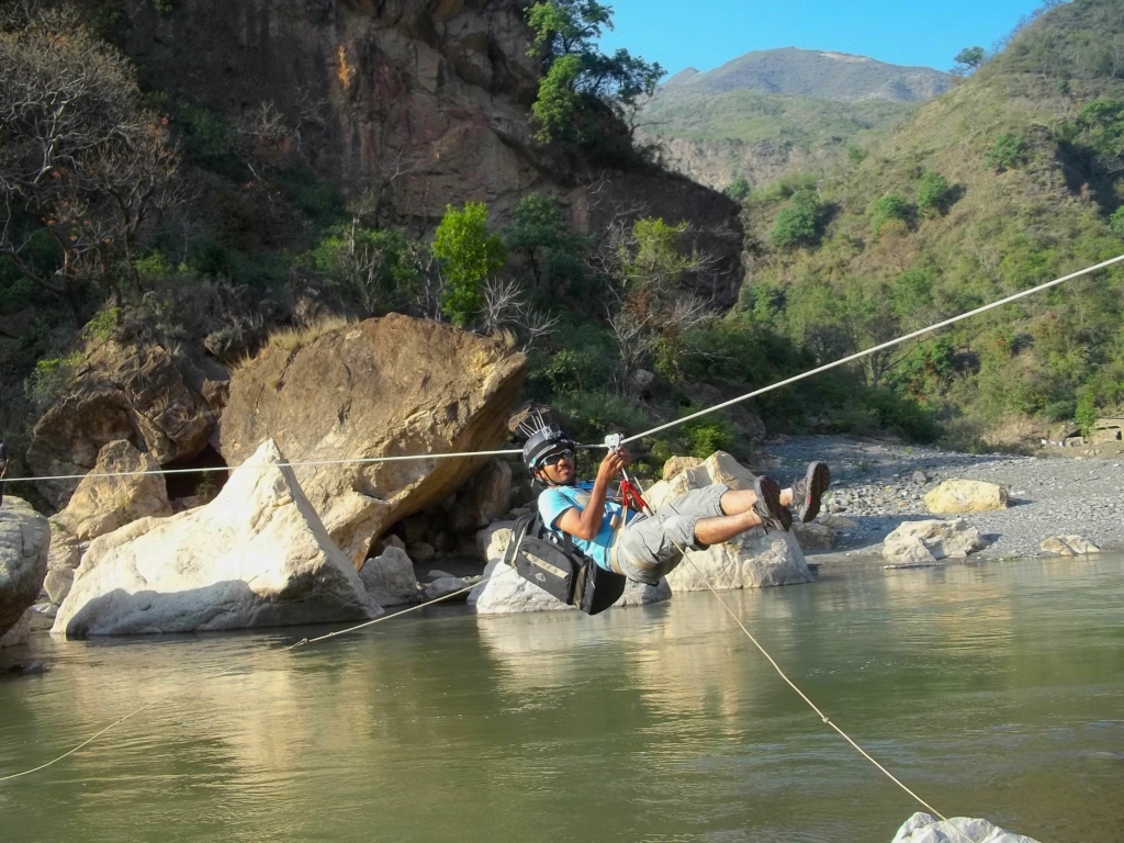 river crossing is one of the things to do in tirthan valley